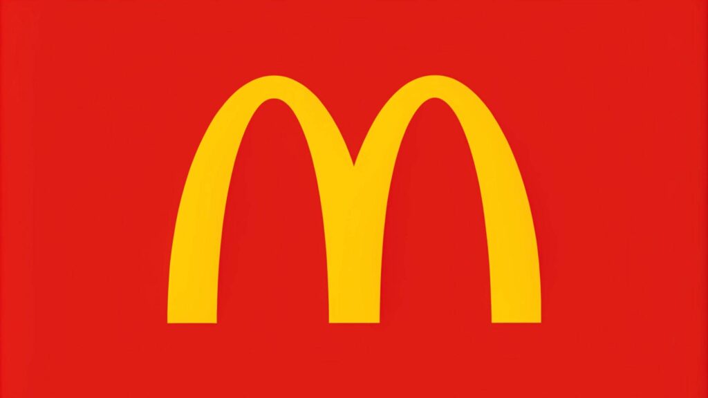 McDonald's logo design with famous golden arches symbol on a red background