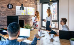 Entrepreneur delivering a business introduction to boost brand visibility in 2025
